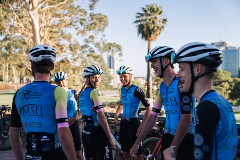 Junior cyclists training together outdoors